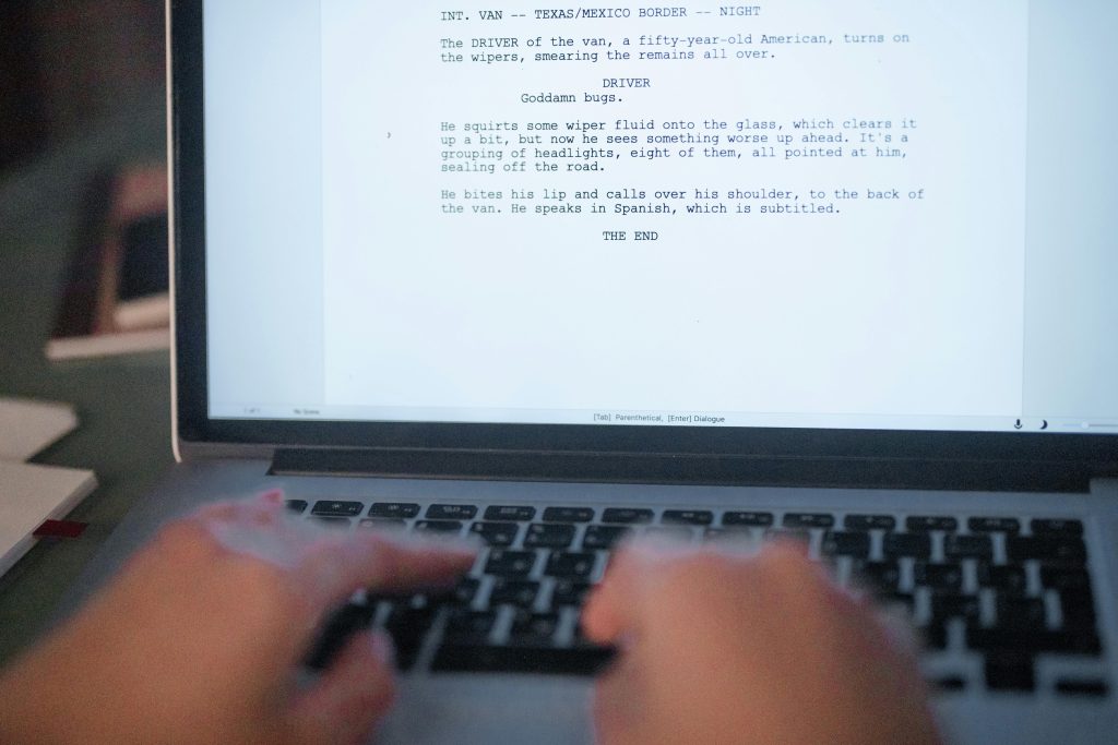 Indie author preparing fiction manuscript for professional editing services